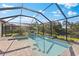 This beautiful pool is perfect for entertaining and enjoying the lake view at 220 Cassano Dr, Nokomis, FL 34275