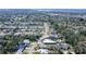 High angle aerial view showcasing the property's location within a residential neighborhood near the water at 2406 Breakwater Cir, Sarasota, FL 34231