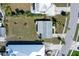 Aerial view of the property showing the layout of the house and surrounding land at 2406 Breakwater Cir, Sarasota, FL 34231