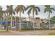 Mexican bar and grill exterior showcasing signage, landscaping and a welcoming facade with palm trees at 2406 Breakwater Cir, Sarasota, FL 34231