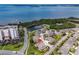 Aerial view shows residential neighborhood, golf course, a lake and waterway at 2904 Captains Ct # 2904, Palmetto, FL 34221