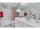 Bathroom with white vanity, combination tub and shower at 2904 Captains Ct # 2904, Palmetto, FL 34221