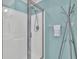 Bathroom featuring a shower with glass door, towel rack and decor at 2904 Captains Ct # 2904, Palmetto, FL 34221