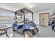 Spacious garage featuring a golf cart, offering convenient storage and recreational possibilities at 2904 Captains Ct # 2904, Palmetto, FL 34221