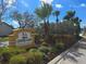 Centre Lake community sign enhanced by tropical palms and well-maintained shrubbery at 3507 65Th Avenue E Cir, Sarasota, FL 34243