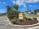 Inviting community sign for Centre Lake, nestled amidst beautiful greenery and landscaping at 3507 65Th Avenue E Cir, Sarasota, FL 34243