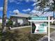 Charming single-story home featuring well-kept landscaping and a modern paint scheme at 3507 65Th Avenue E Cir, Sarasota, FL 34243