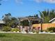 Charming pergola-covered outdoor seating area perfect for relaxation and entertaining at 3507 65Th Avenue E Cir, Sarasota, FL 34243