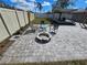 Backyard patio with a fire pit and outdoor seating, perfect for entertaining at 3507 65Th Avenue E Cir, Sarasota, FL 34243