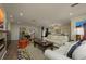 Bright and spacious living room featuring stylish sofas, a modern fireplace, and an open floor plan at 3641 Gleneagle Dr # 12D, Sarasota, FL 34238