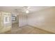 Bedroom features neutral colored walls, carpet flooring, double closets and a ceiling fan at 3692 Glen Oaks Manor Dr, Sarasota, FL 34232
