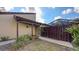 Charming front entrance of home with privacy fence and lush landscaping at 3692 Glen Oaks Manor Dr, Sarasota, FL 34232