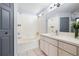 Bathroom with a shower-tub combo, single sink and grey door at 3831 Day Bridge Pl, Ellenton, FL 34222