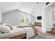 Bedroom with two windows, a ceiling fan and a large bed at 3831 Day Bridge Pl, Ellenton, FL 34222