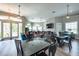 Spacious clubhouse featuring ample seating, tables, and a large television for community gatherings at 3831 Day Bridge Pl, Ellenton, FL 34222