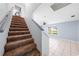 Bright entryway featuring carpeted stairs, ceramic tile and a ceiling fan at 3831 Day Bridge Pl, Ellenton, FL 34222
