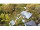 Aerial view of a backyard featuring an outdoor seating area, a gazebo, and mature landscaping at 4045 Lisbon Pl, Sarasota, FL 34231