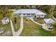 Aerial view of backyard featuring an outdoor seating area, a gazebo, and mature landscaping at 4045 Lisbon Pl, Sarasota, FL 34231