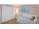 Bedroom features pink walls, white accents, carpeted floors, and a window at 4045 Lisbon Pl, Sarasota, FL 34231
