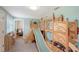 Spacious playroom featuring light blue walls and a large indoor wooden play structure at 4045 Lisbon Pl, Sarasota, FL 34231