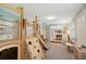 Bright playroom featuring light blue walls and a large indoor wooden play structure at 4045 Lisbon Pl, Sarasota, FL 34231