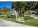 Two-story house with green lawn, mailbox, and a sidewalk at 4255 67Th Avenue E Cir, Sarasota, FL 34243