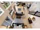 Aerial view of the home's open floor plan showcasing the living room, kitchen, and dining areas at 4255 67Th Avenue E Cir, Sarasota, FL 34243