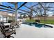 Screened pool area featuring stylish outdoor seating at 4255 67Th Avenue E Cir, Sarasota, FL 34243