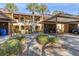 Charming condo with covered parking, lush landscaping, and inviting walkways at 4414 Spicewood Dr # H, Bradenton, FL 34208