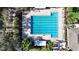 Aerial view of the sparkling community pool with lap lanes, ample seating, lush landscaping, and plenty of space to relax at 4744 105Th E Ave, Parrish, FL 34219