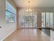 Dining area featuring plantation shutters offering an abundance of natural light and outdoor view at 4744 105Th E Ave, Parrish, FL 34219