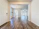 Spacious entryway featuring attractive hardwood floors and an open floor plan layout at 4744 105Th E Ave, Parrish, FL 34219