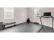 Exercise room featuring a treadmill and weightlifting equipment at 5119 Admiral Pointe Dr, Apollo Beach, FL 33572