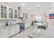 Kitchen with stainless steel appliances, granite countertops, and stylish cabinetry at 5119 Admiral Pointe Dr, Apollo Beach, FL 33572