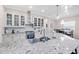 Spacious kitchen featuring an island, modern appliances, and ample cabinet space at 5119 Admiral Pointe Dr, Apollo Beach, FL 33572