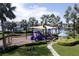 Community playground features a covered play structure with slides and a swing set near a gazebo at 5119 Admiral Pointe Dr, Apollo Beach, FL 33572