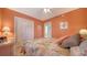 Inviting bedroom featuring a queen bed, matching nightstands, and ample closet space at 5525 Shadow Lawn Dr, Sarasota, FL 34242