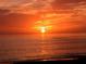 Captivating sunset over the ocean, creating a serene and tranquil scene at 5525 Shadow Lawn Dr, Sarasota, FL 34242