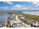 Wide aerial shot showcasing a residential area with waterfront views and well-maintained homes at 5608 Tidewater Preserve Blvd, Bradenton, FL 34208