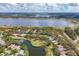 Waterfront golf course community with serene lakes, offering scenic views and a tranquil lifestyle at 5655 Downham Mdws, Sarasota, FL 34235