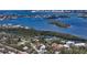 Aerial view of a waterfront community showing the home's location near the water and downtown at 614 Tropical Cir, Sarasota, FL 34242