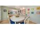 Charming dining room adjacent to the living room and kitchen at 614 Tropical Cir, Sarasota, FL 34242