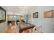 Elegant dining room with a crystal chandelier and classic decor at 614 Tropical Cir, Sarasota, FL 34242