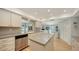 Bright kitchen with stainless steel appliances, ample counter space, and an open layout at 614 Tropical Cir, Sarasota, FL 34242