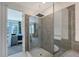 Modern bathroom featuring a glass-enclosed shower with stylish tiling and fixtures at 6378 Grandview Hill Ct, Bradenton, FL 34203
