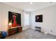 Well-lit room featuring modern art, and minimalist decor, enhanced by natural light from a window at 6378 Grandview Hill Ct, Bradenton, FL 34203