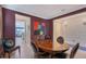 Well-appointed dining room with a round table, stylish artwork, and inviting atmosphere at 6378 Grandview Hill Ct, Bradenton, FL 34203