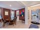 Elegant dining room featuring a round table, sophisticated decor, and an open layout at 6378 Grandview Hill Ct, Bradenton, FL 34203