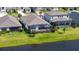 Aerial view of home showcasing screened in patio, pool, and landscaping, perfect for outdoor enjoyment at 6378 Grandview Hill Ct, Bradenton, FL 34203