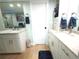Elegant bathroom featuring dual sinks, granite countertops, and modern fixtures at 6415 Midnight Pass Rd # 904, Sarasota, FL 34242